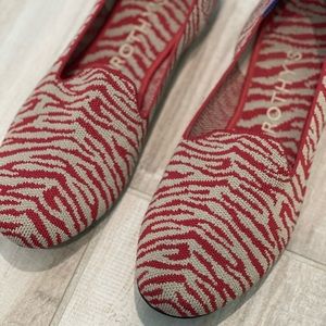Rothy’s loafers in red animal print